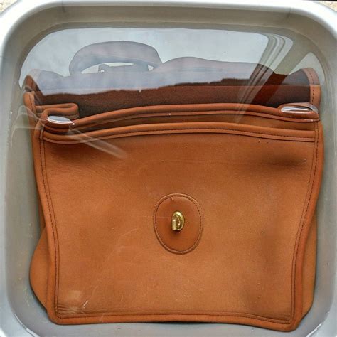 cleaning vintage coach leather purse.